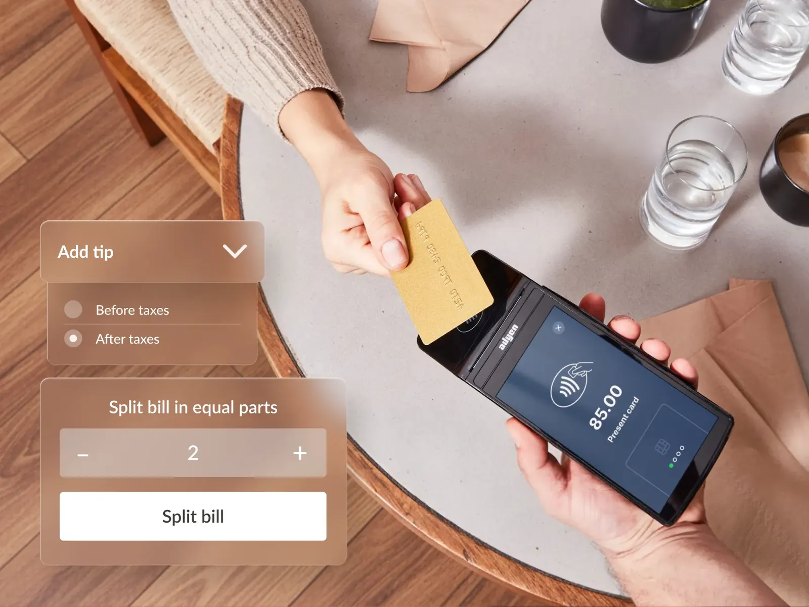 Hands tapping a card on a handheld terminal with a tip and split-bill panel
